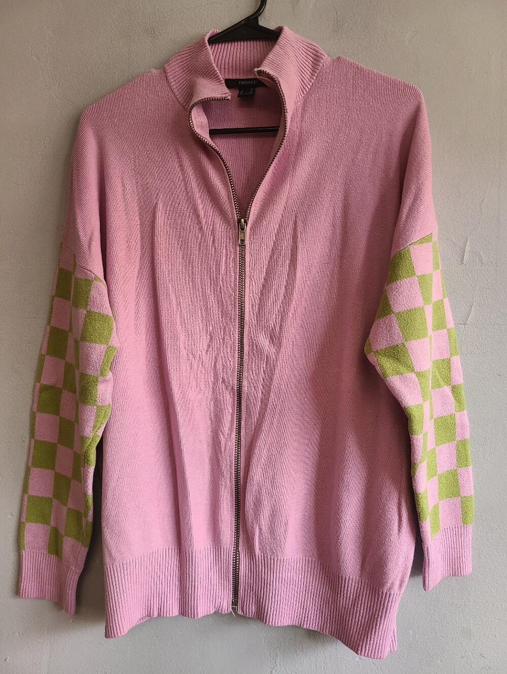 Women's medium large XL pink zip-up cardigan/jacket with green checkered sleeves